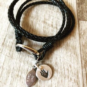 Single charm plaited leather wrap around bracelet