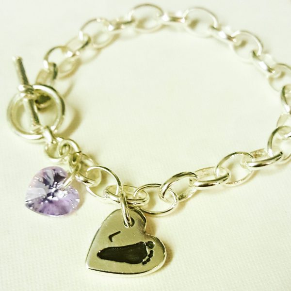 Double sided hand or footprint charm bracelet. Chunky chain with hoop & T-bar clasp and heart crystal.